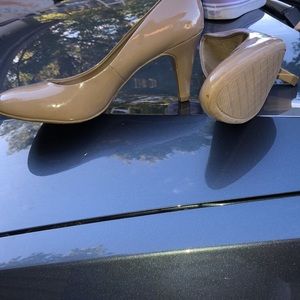 Nude glossy heels